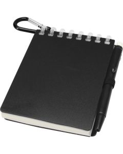 Pikkuvihko kynällä